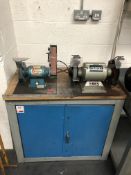 Metal two door cabinet with bench mounted 6" grinder and Draper twin pedestal grinder (Located Milto