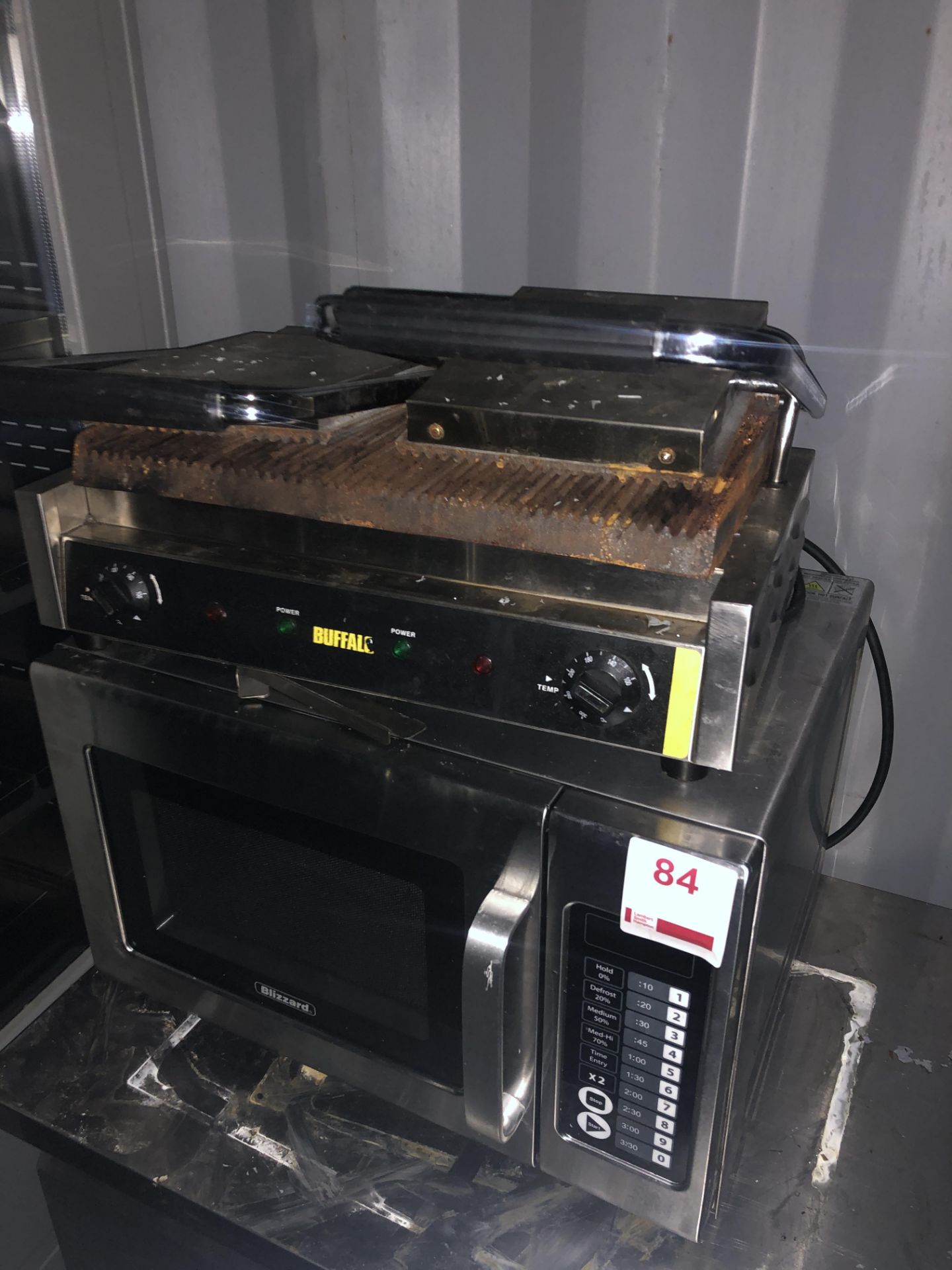 Blizzard commercial microwave oven and a Buffalo sandwich toaster