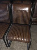 Ten brown leather upholstered metal frame dining chairs