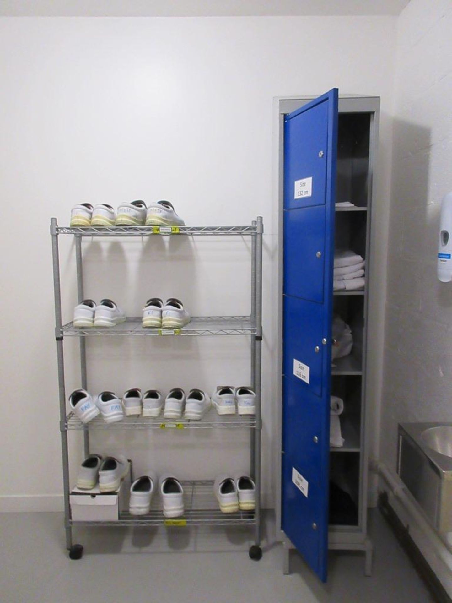 Two metal single door personnel lockers, metal slatted bench seat, 2 x chrome 3/4 shelf racks