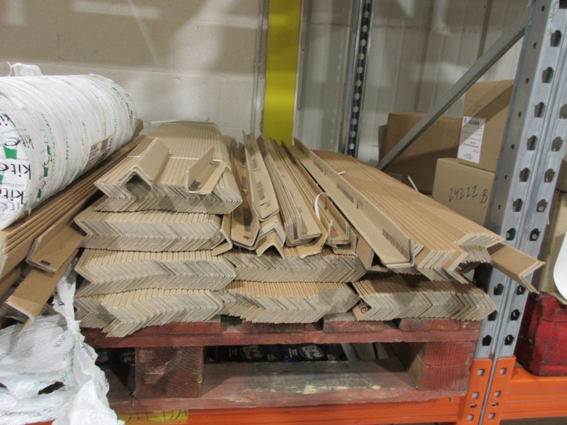 Four part pallets of unbranded packaging including pallet corners, box dividers, pallet paper etc.