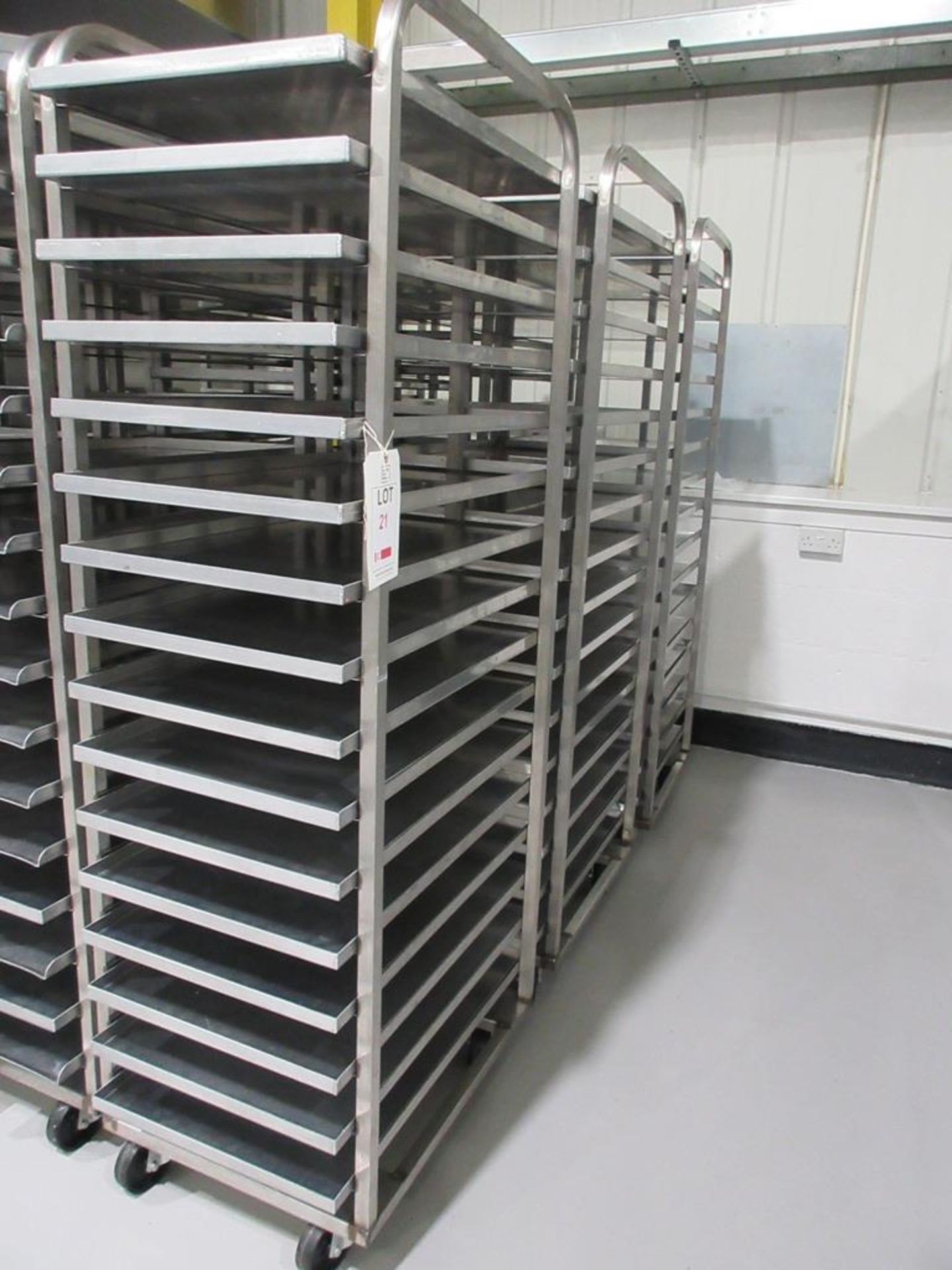 Three stainless Steel mobile 16 compartment tray racks, 530mm x 760mm x 1800mm