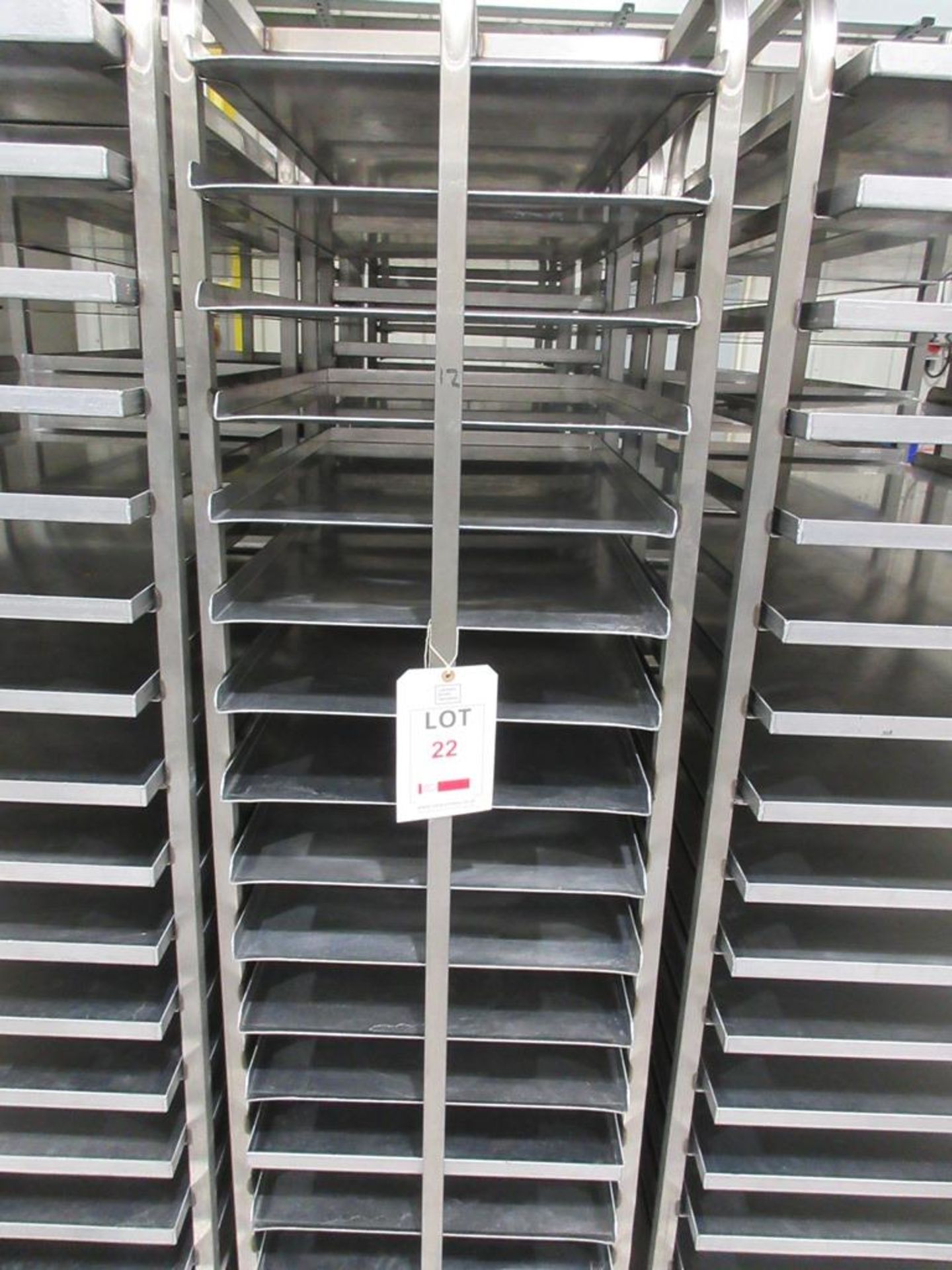 Three stainless Steel mobile 16 compartment tray racks, 530mm x 760mm x 1800mm