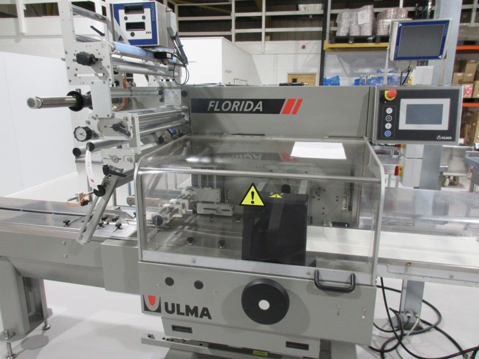 Ulma Florida through feed flow pack wrapper, serial no. 142276 (2016), with Zodiac ES touch screen - Image 8 of 11