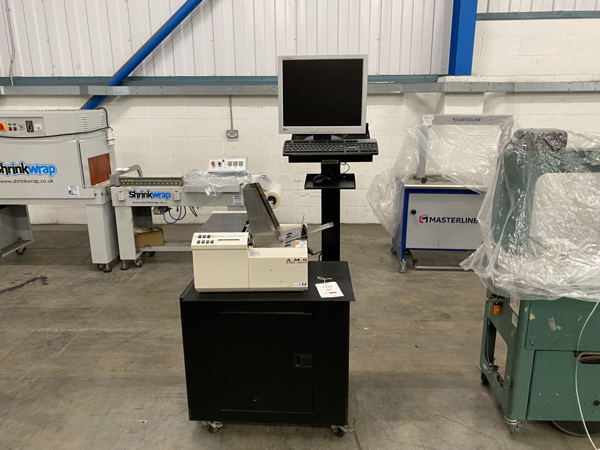 AMS Astrojet 1000 feeder with computer control cabinet