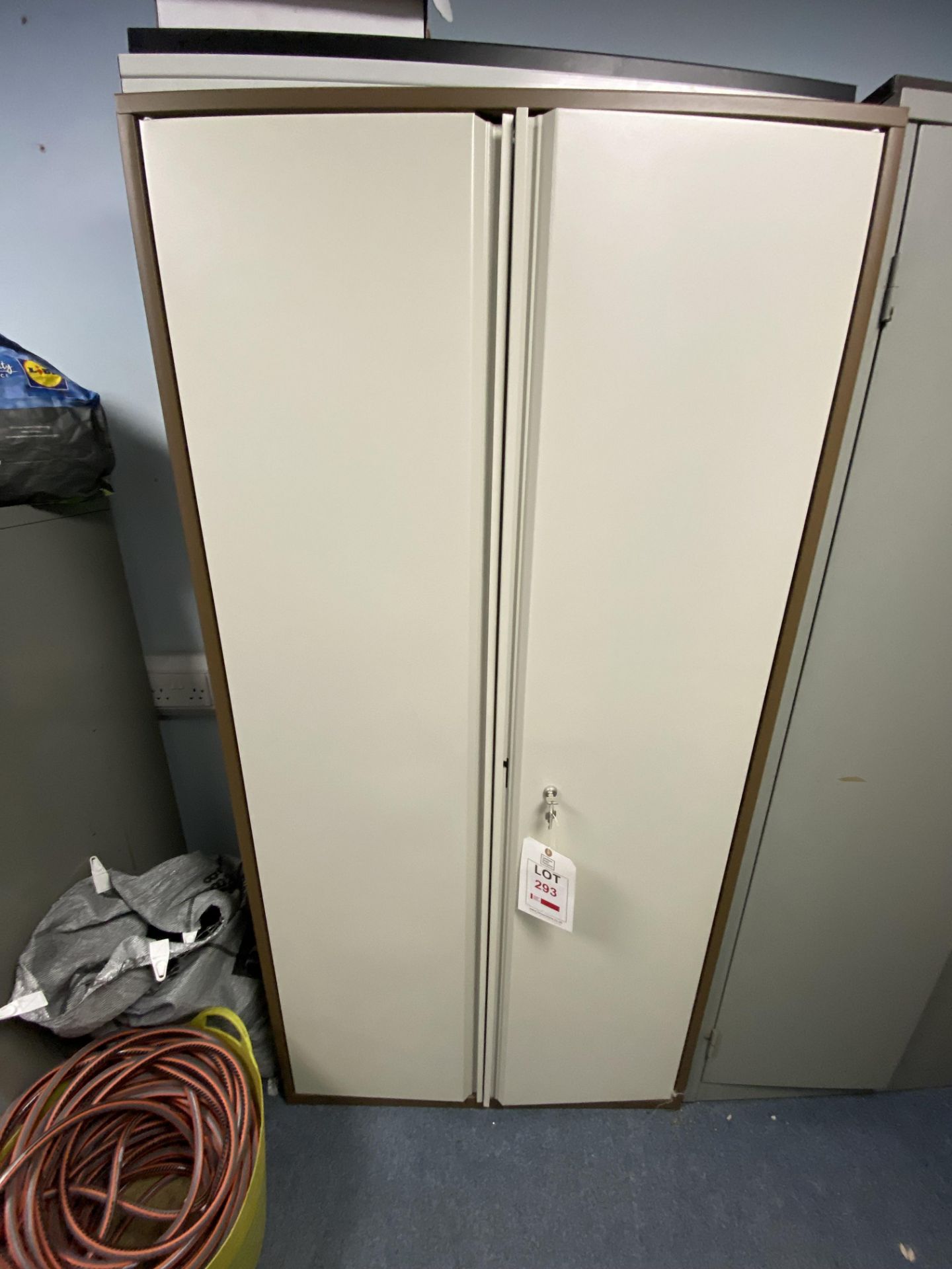 Three metal, 2-door storage cabinets (2 - with keys, 1 - no key)