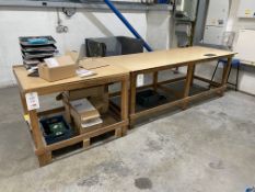 Two wooden work benches