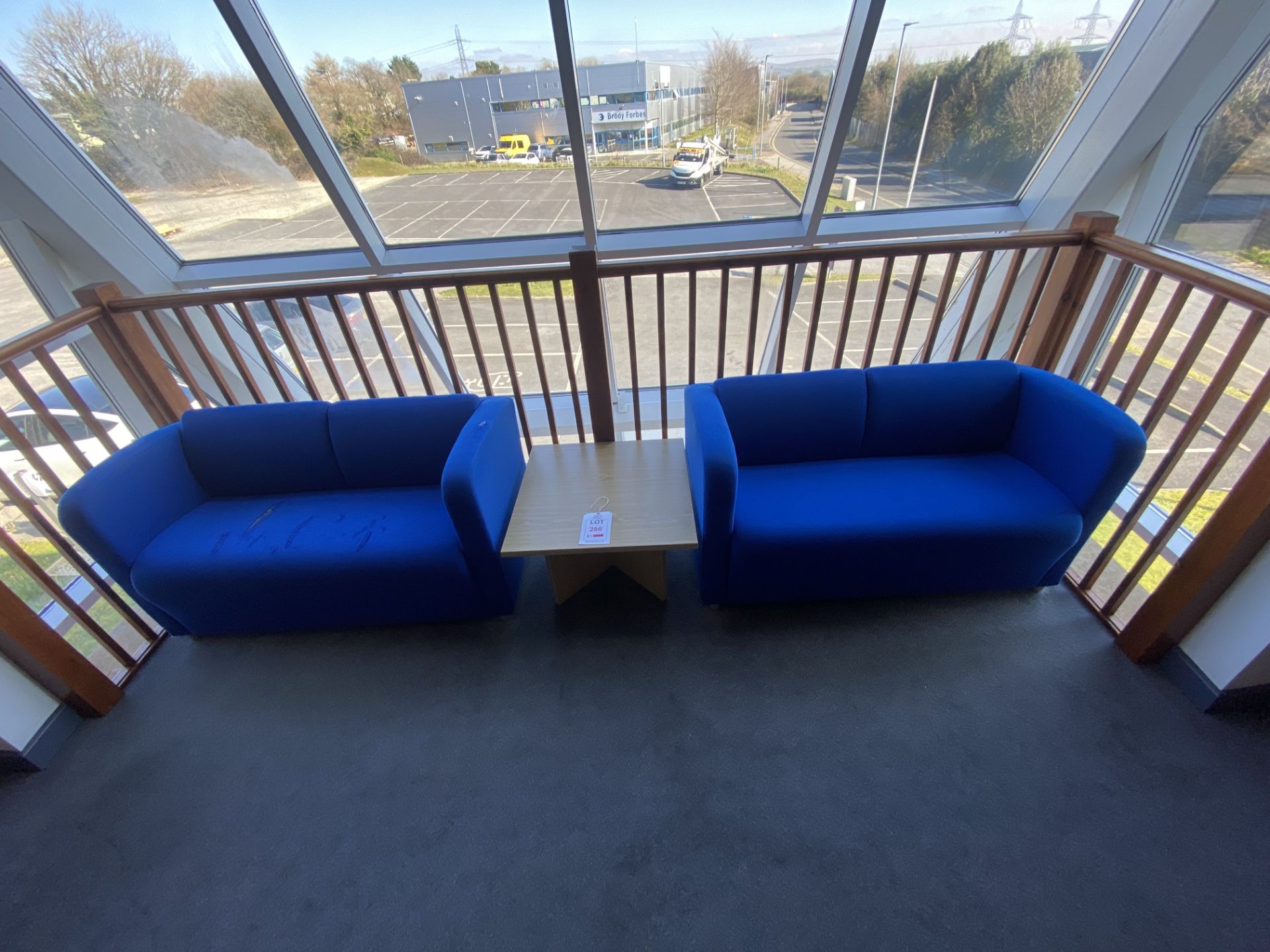 Office waiting room furniture, to include two blue single upholstered seats, two blue double