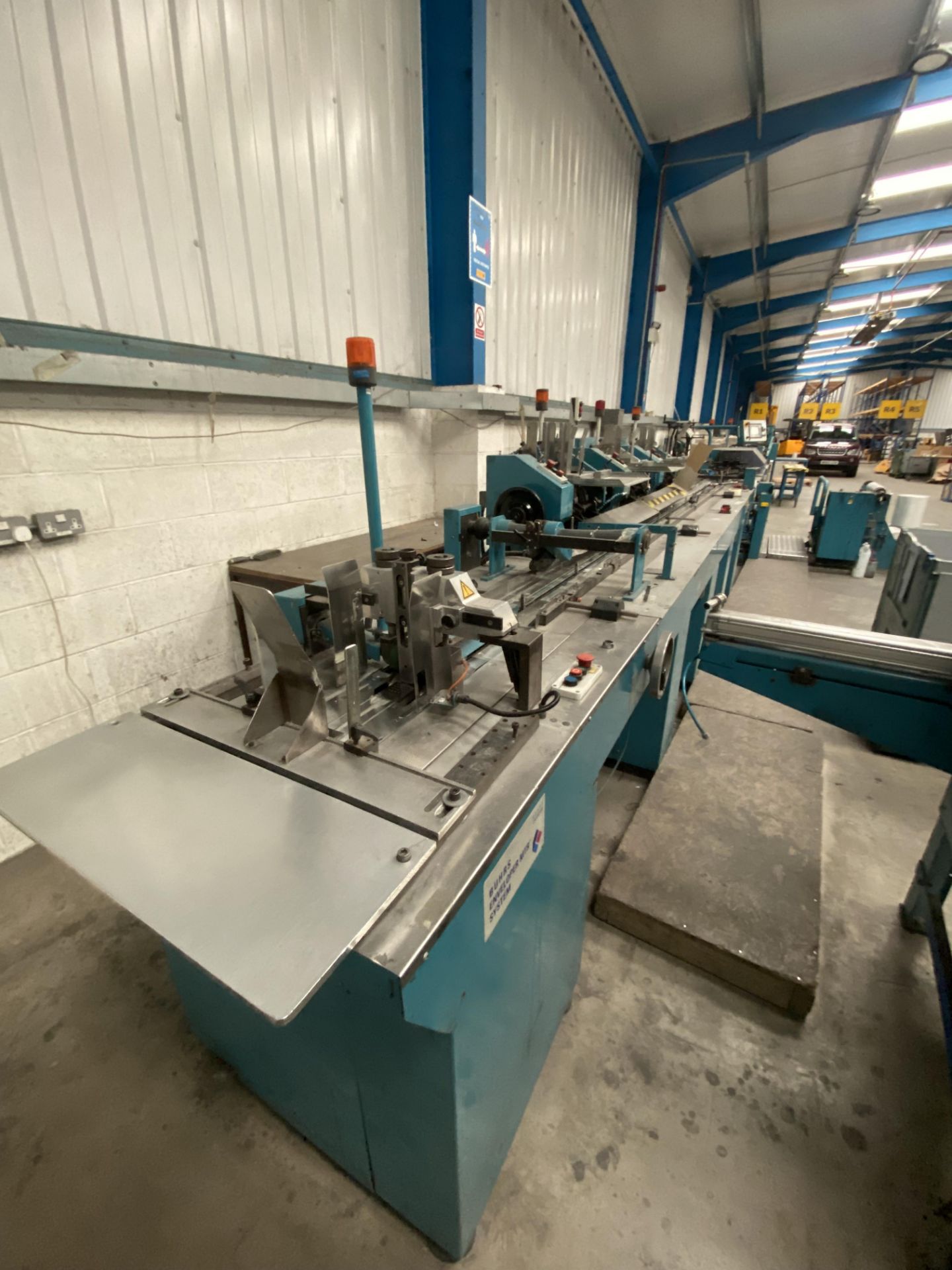 Buhrs Zaandam polywrap insertion line, serial no. 4451192 (2001), including 3 insertion heads,