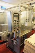 Stainless steel twin bottle carousel filling machine, capacity circa 300 bottles/hr, with perspex