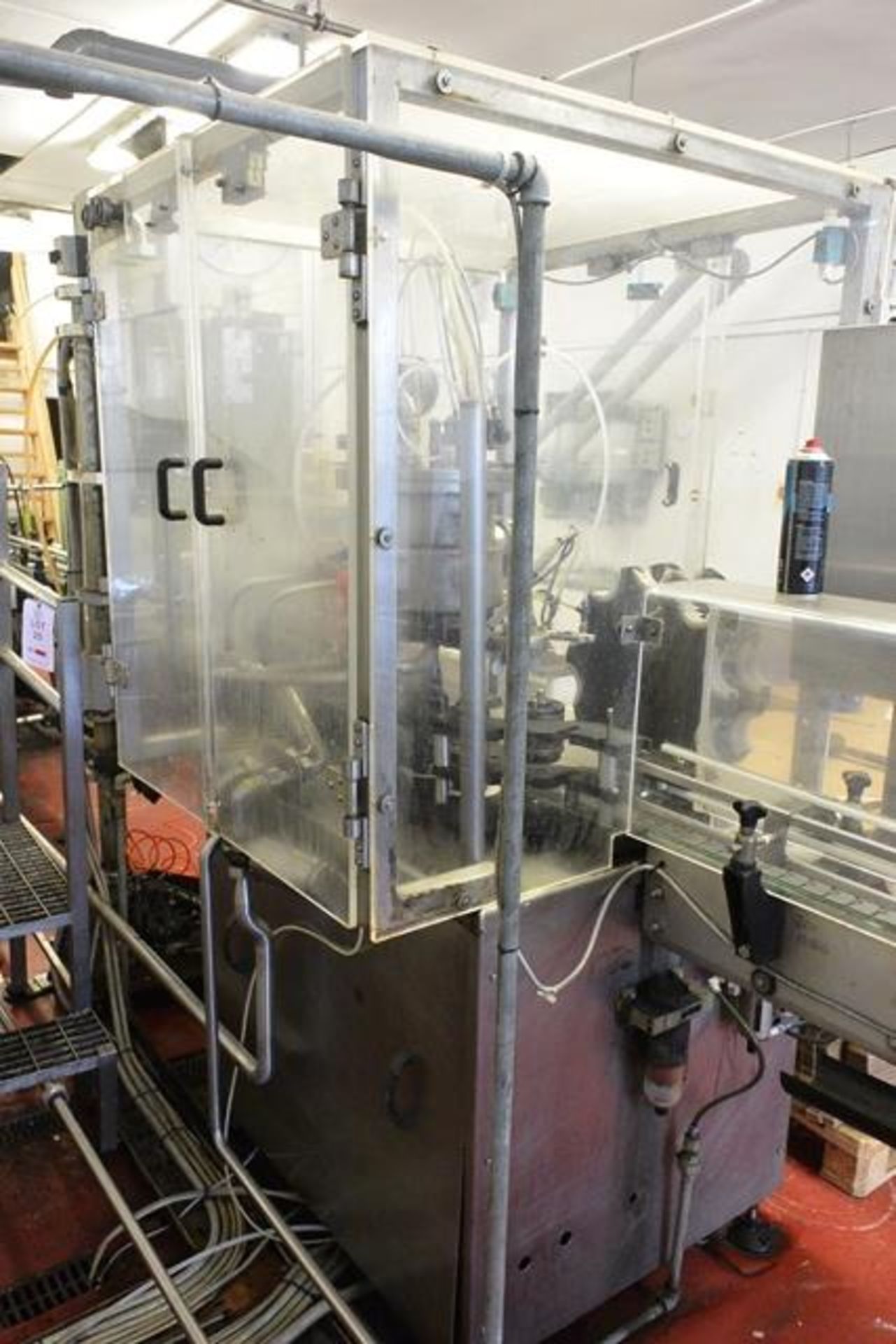 Stainless steel twin bottle carousel filling machine, capacity circa 300 bottles/hr, with perspex - Image 7 of 9