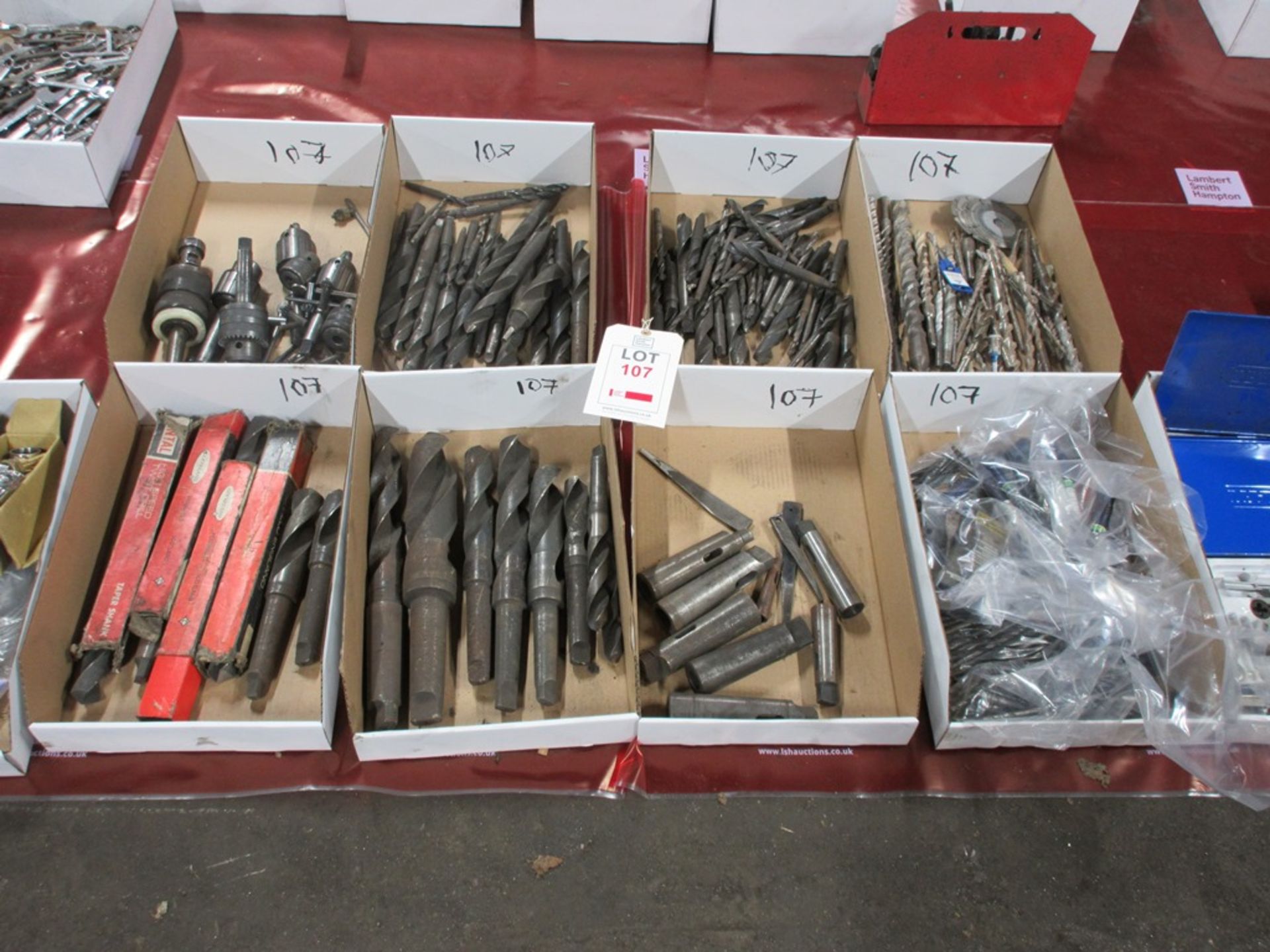 Quantity of assorted drill bits, sleeves, chucks, etc., as lotted