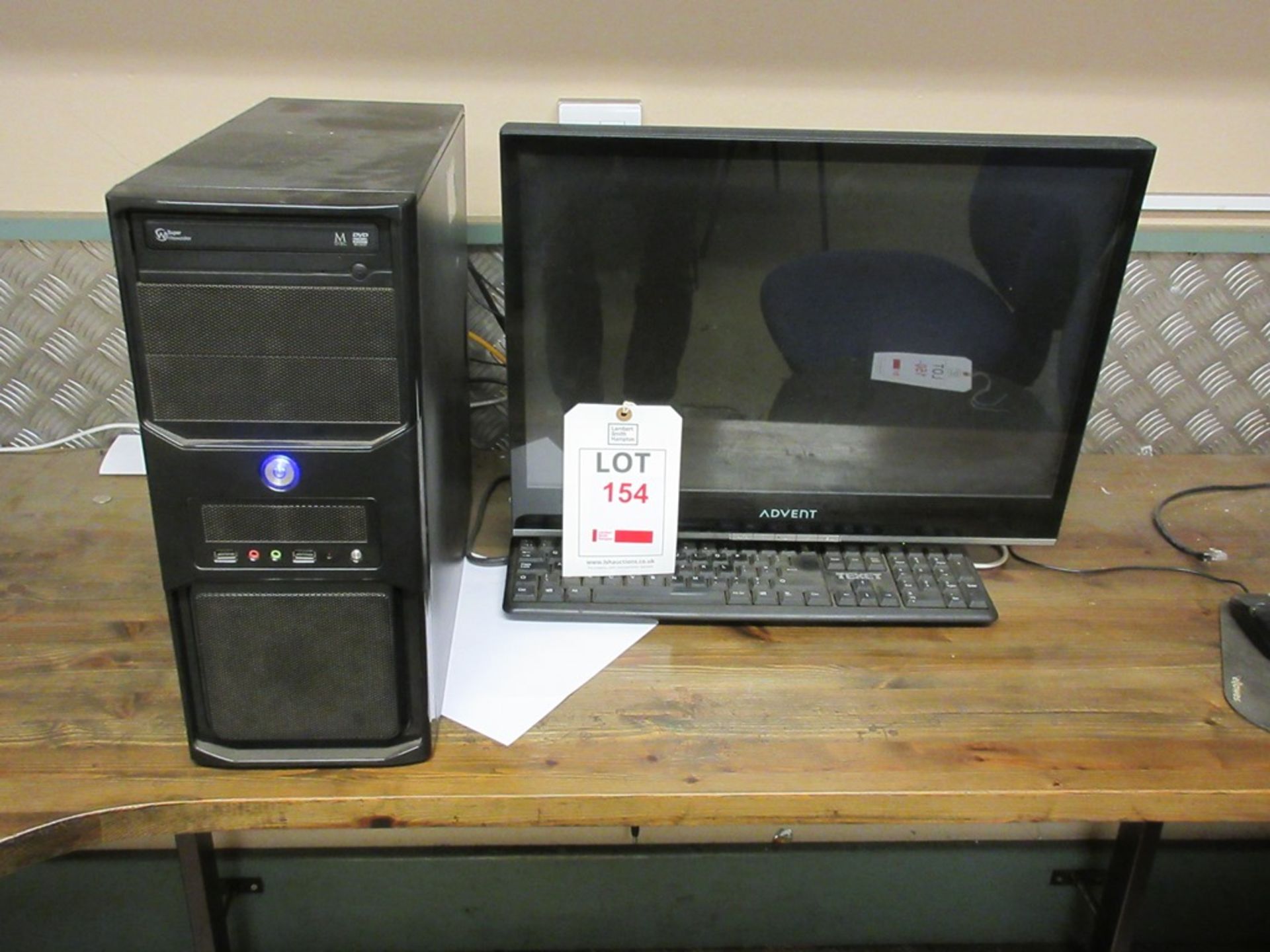 Unbadged computer system, Advent flat screen monitor, keyboard, mouse