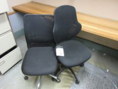 Two assorted upholstered swivel chairs