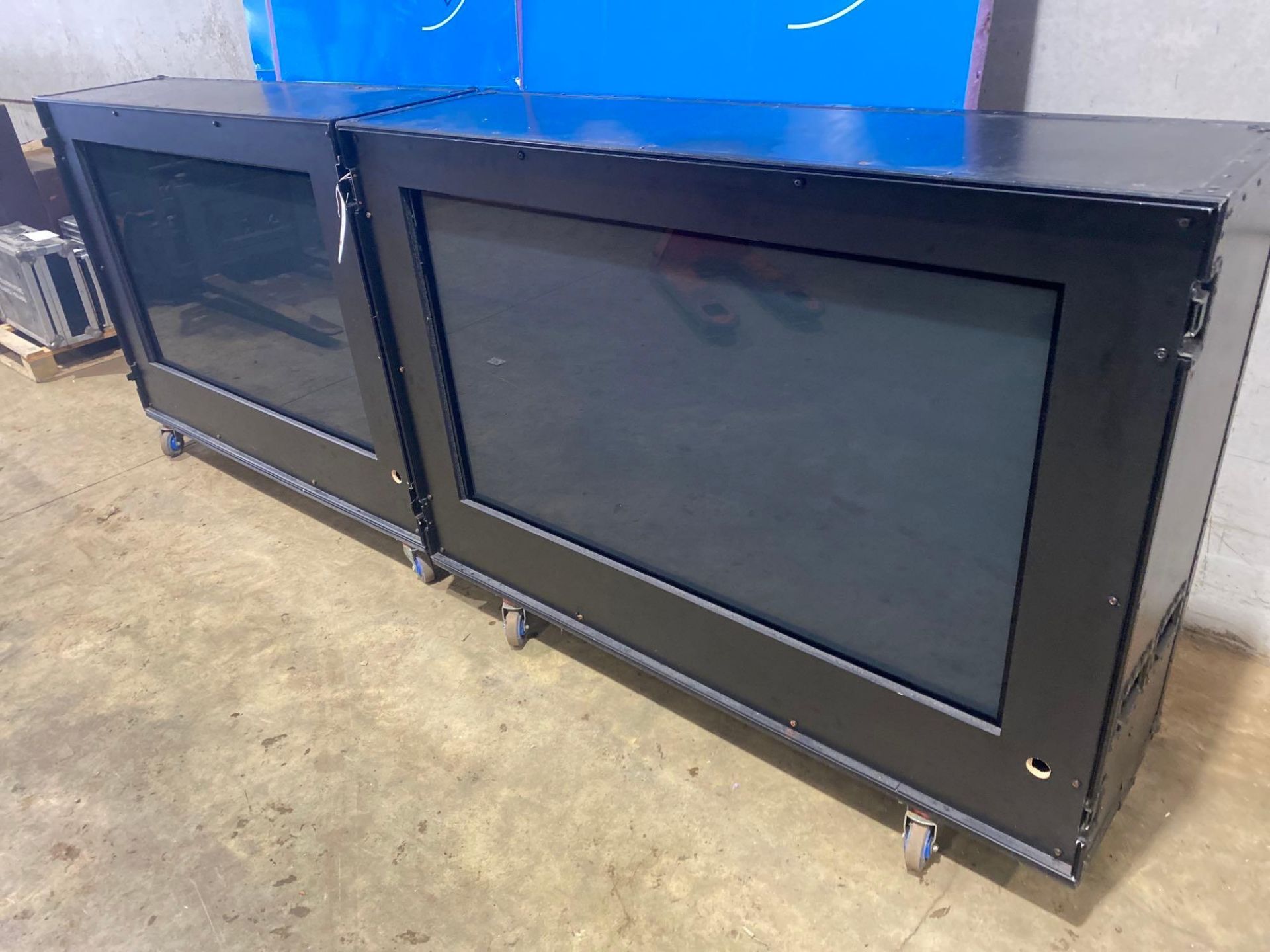 Large mobile flight case comprising two built in 61" display monitors (Located Milton Keynes)