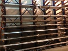 4 bays of heavy duty cantilever racking consisting of 5 L shaped blue frame upright beams 6m tall