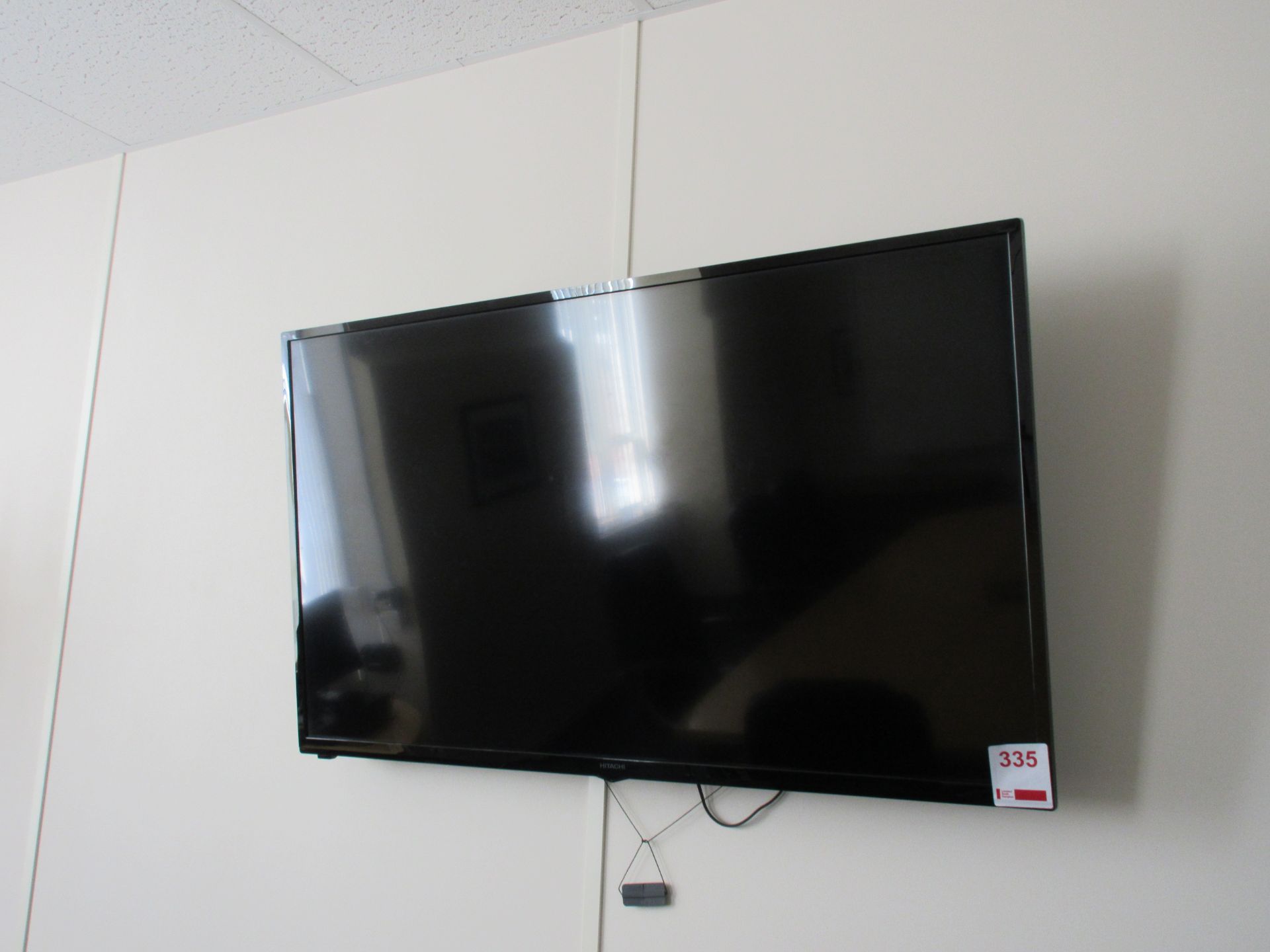 Hitachi wall mounted 50" flat screen TV with remote