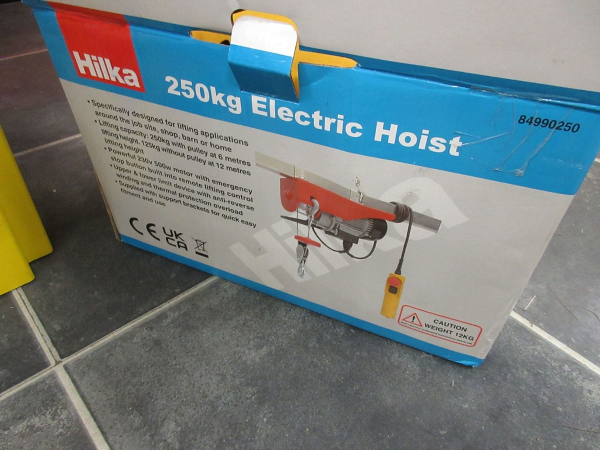 Hilka 250kg electric hoist NB: This item has no record of Thorough Examination. The purchaser must