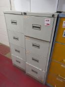 Two metal 4-drawer filing cabinets