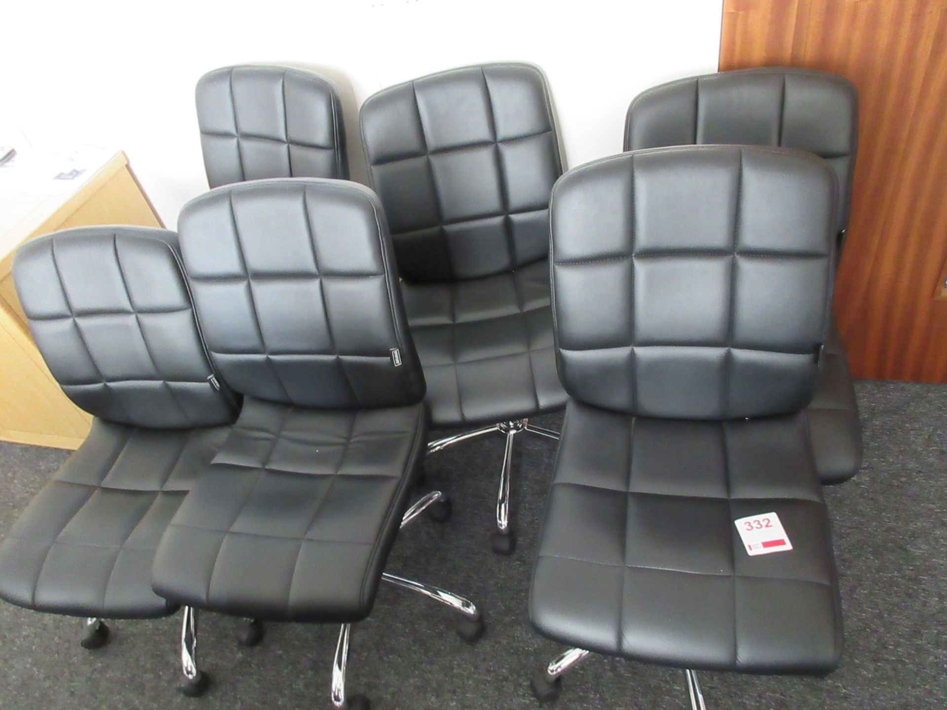 Six Staples leatherette swivel chairs