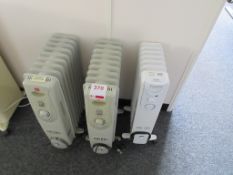 Four assorted mobile electric radiators