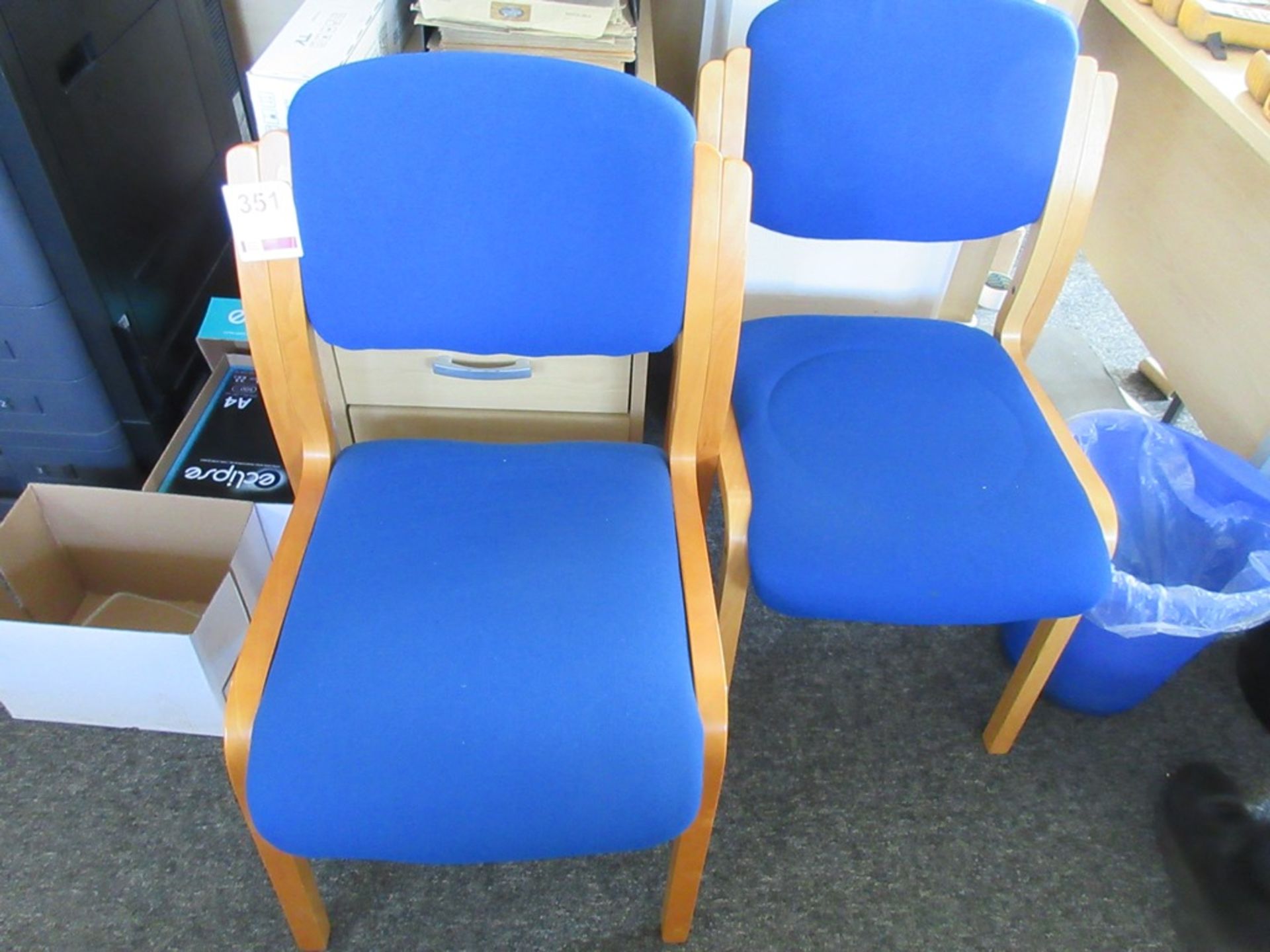 Three wood frame upholstered meeting chairs