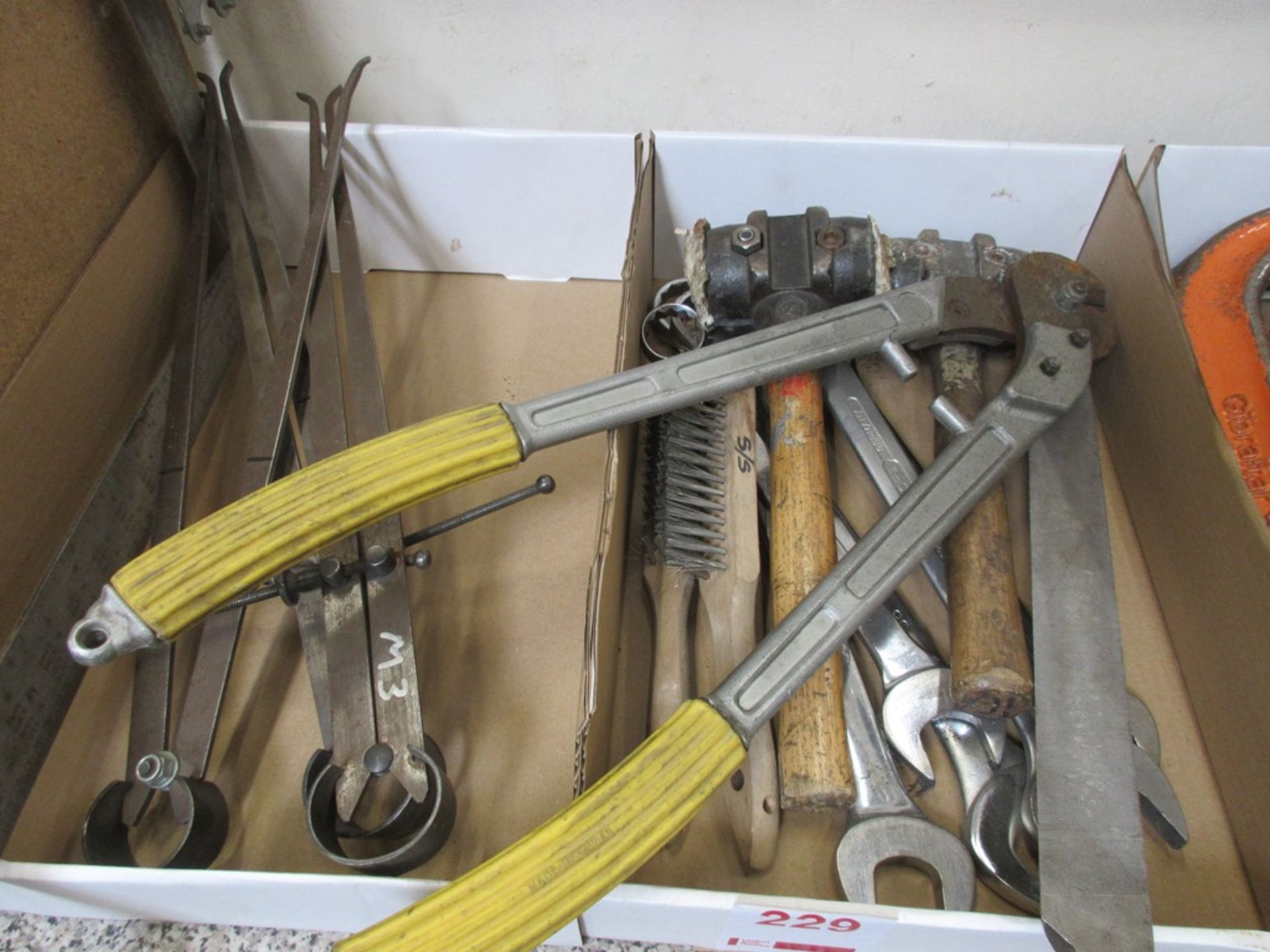 Contents of two boxes including wire brushes, files, spanners, calliper, tool box, part socket