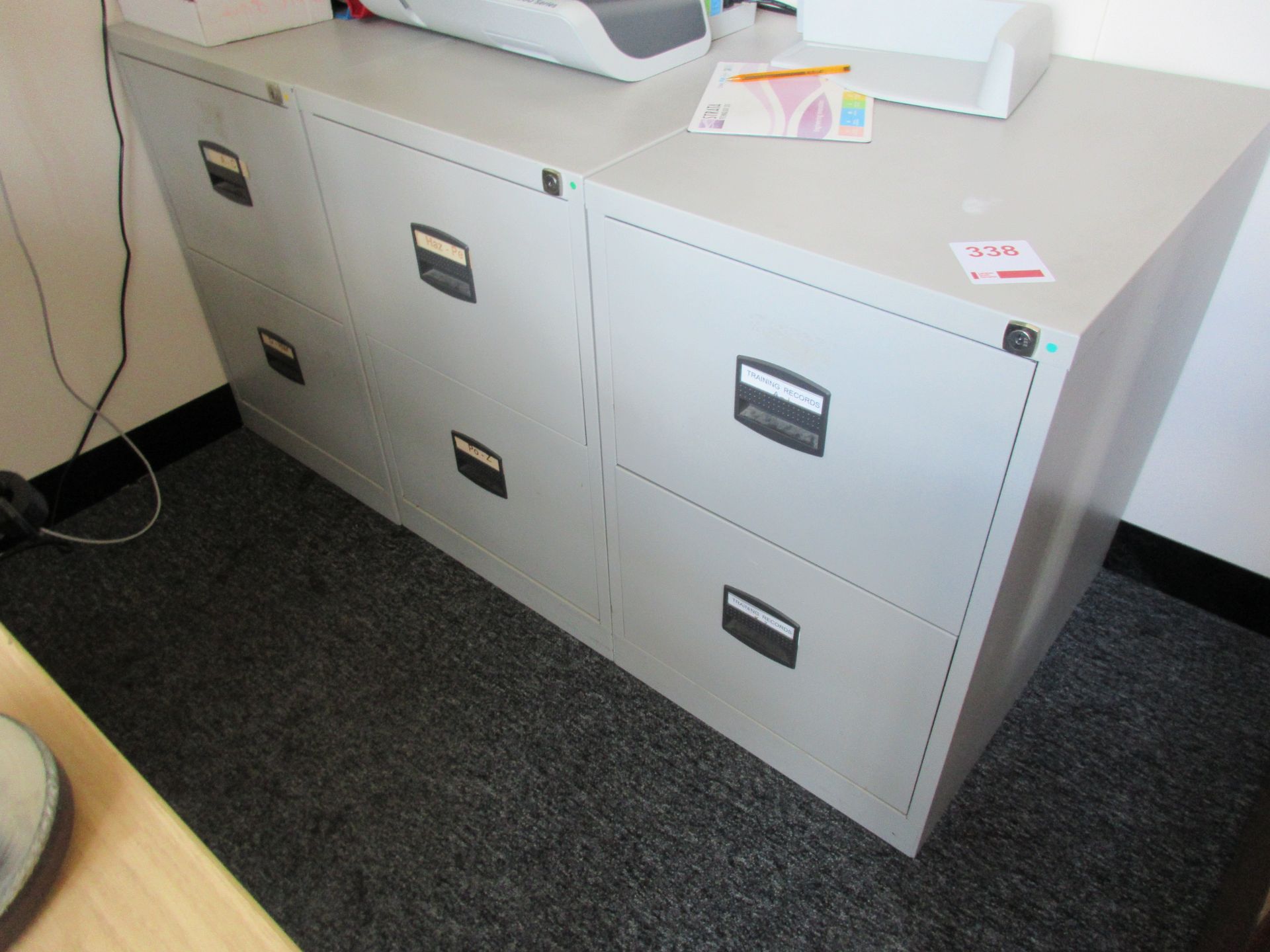 Three metal 2-drawer filing cabinets