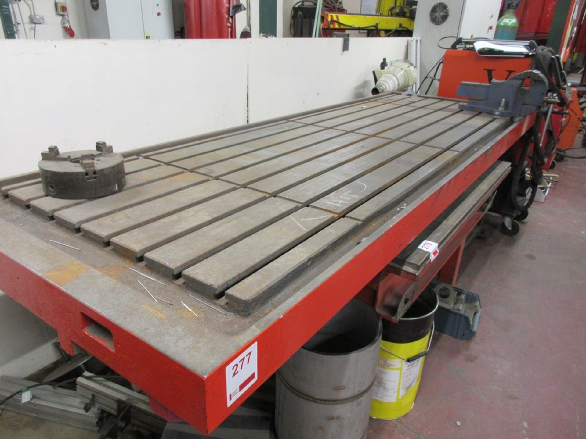 T-Slot table bed, approx. 108" x 36" x 4", no leg with Irwin 4" bench vice