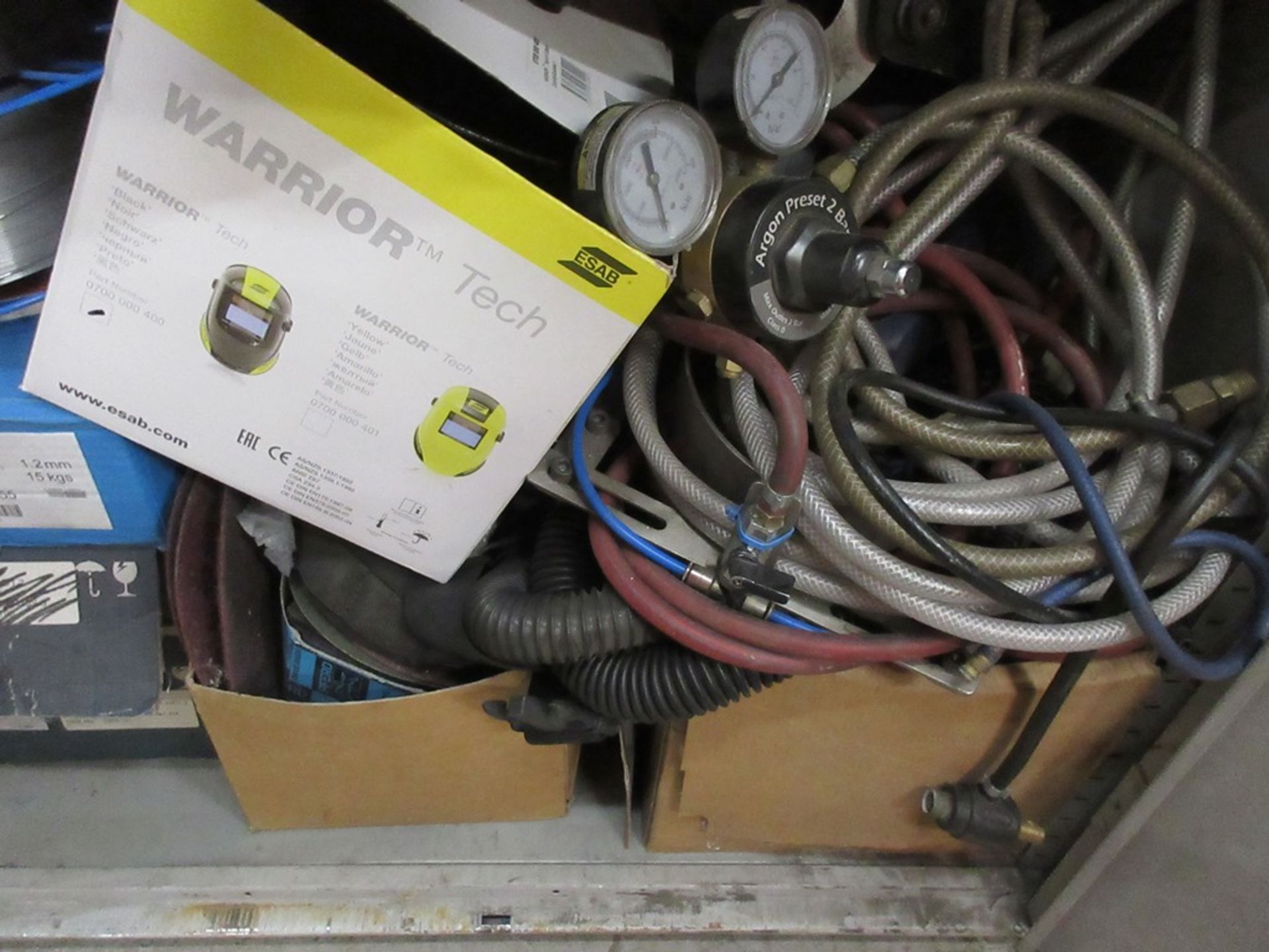 Cupboards and contents including welding rods, weld wire, gas regulators, ESAB warrior welding mask, - Bild 2 aus 7