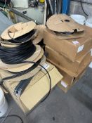 Twenty five buckets and 15 rolls of various rubber gaskets