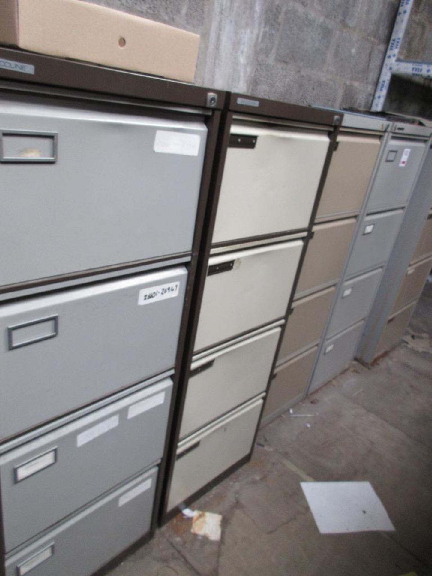 Four metal 4 drawer filing cabinets