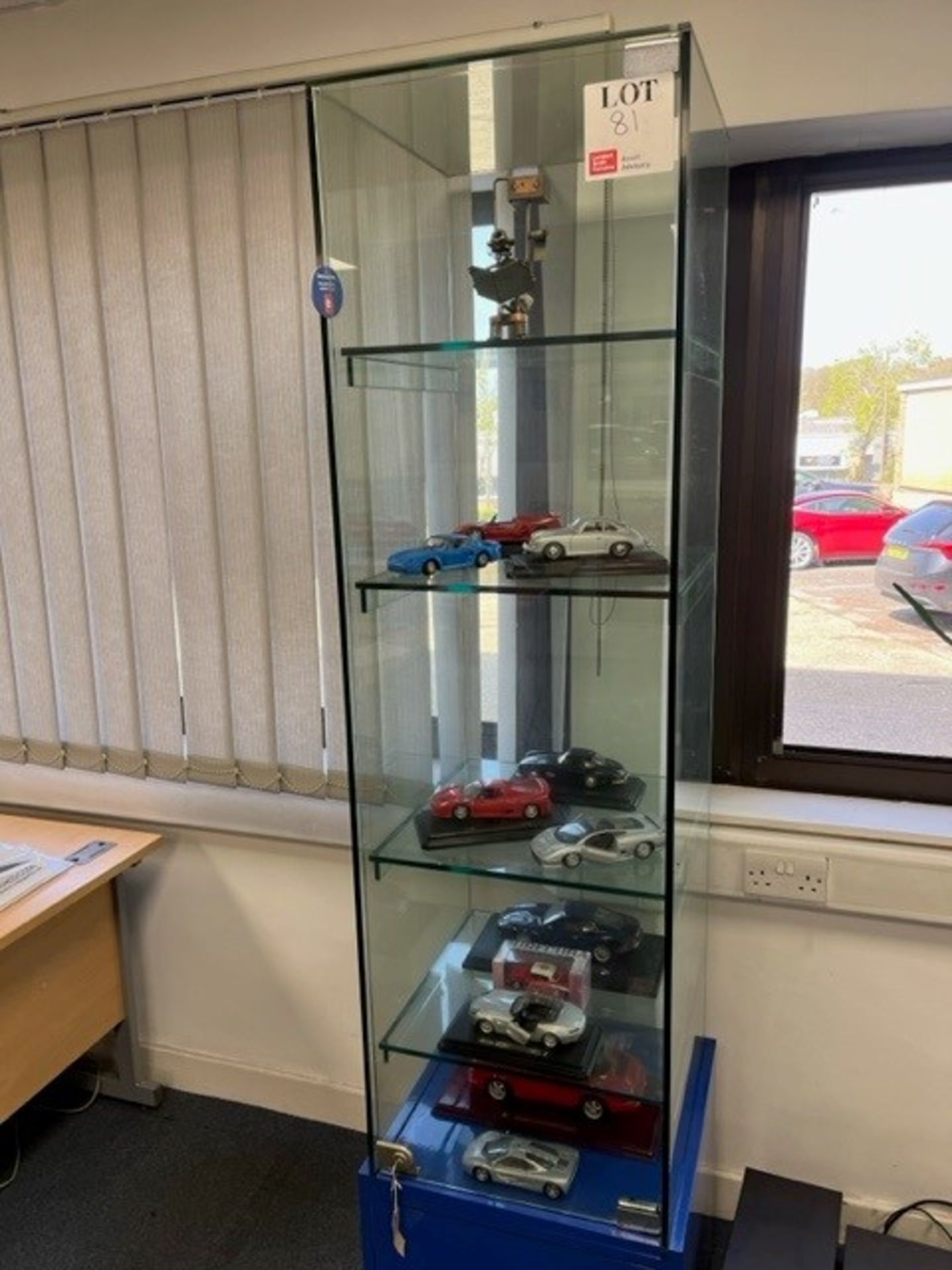 Glass display cabinet and contents ( 11 various model cars)