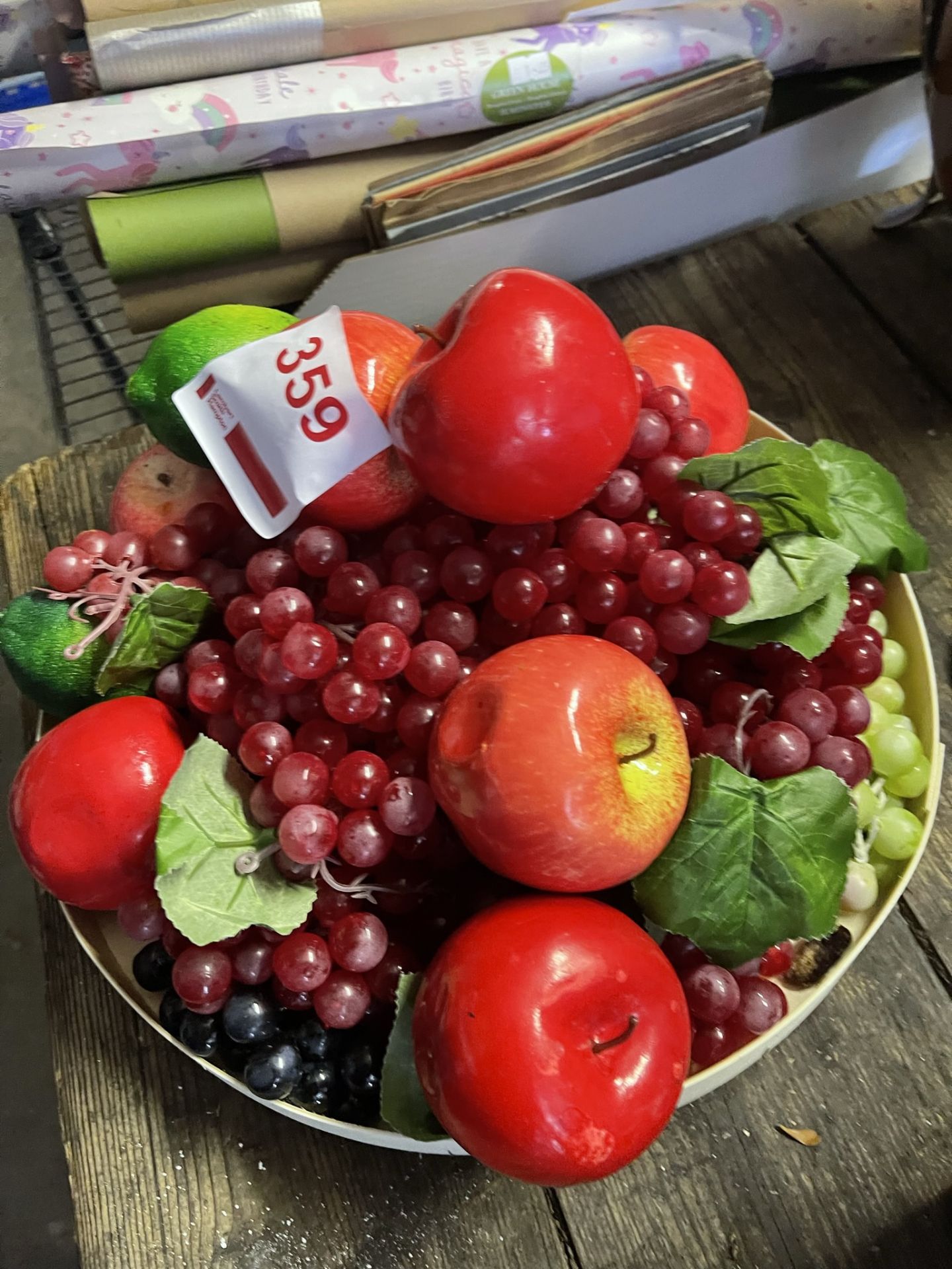 Tray of artificial fruit