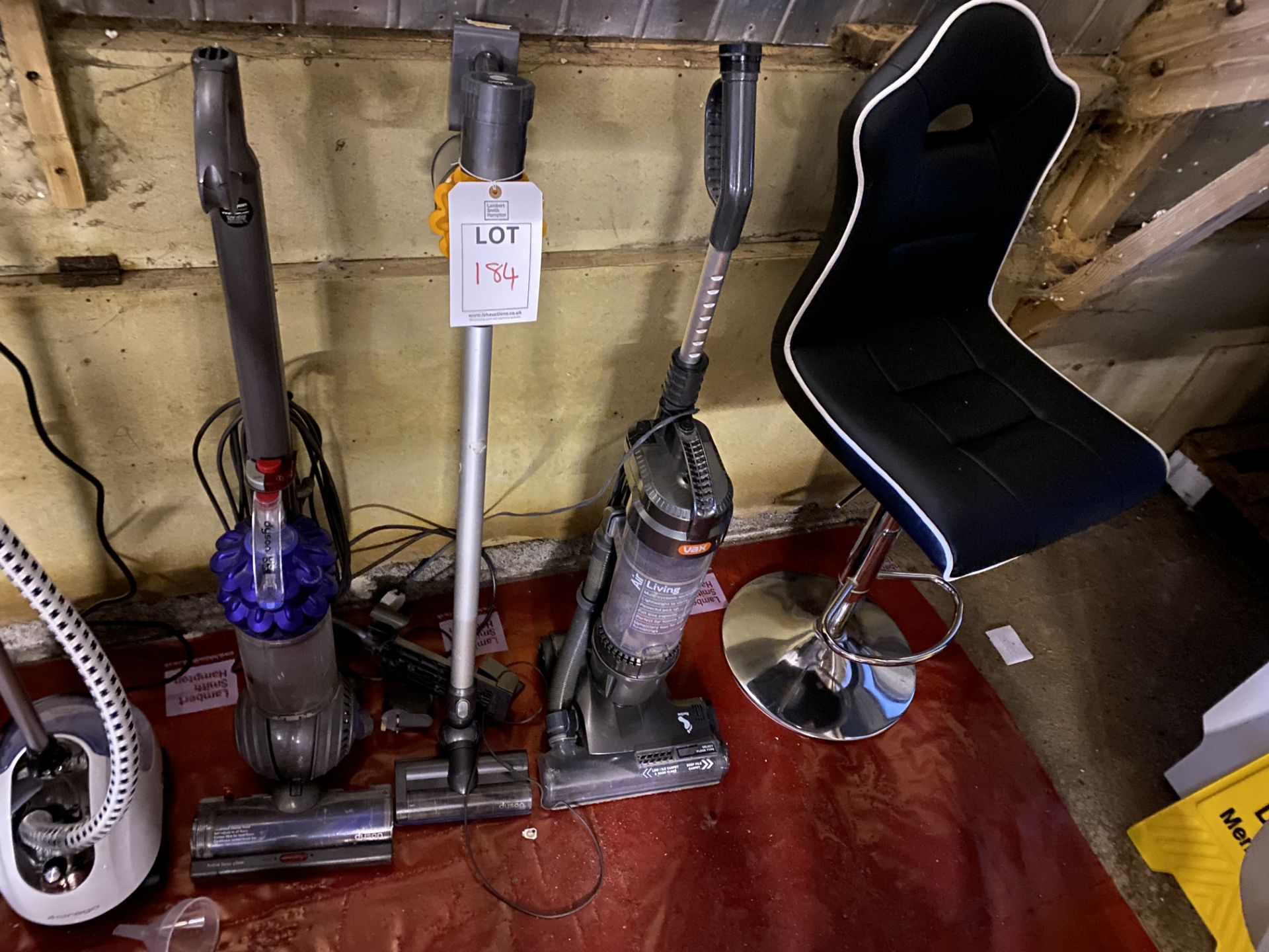 Three Hoovers to consist of 2 Dyson and 1 Vax, one leather effect stool