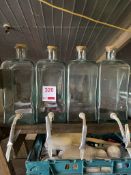 Four glass olive oil dispensers