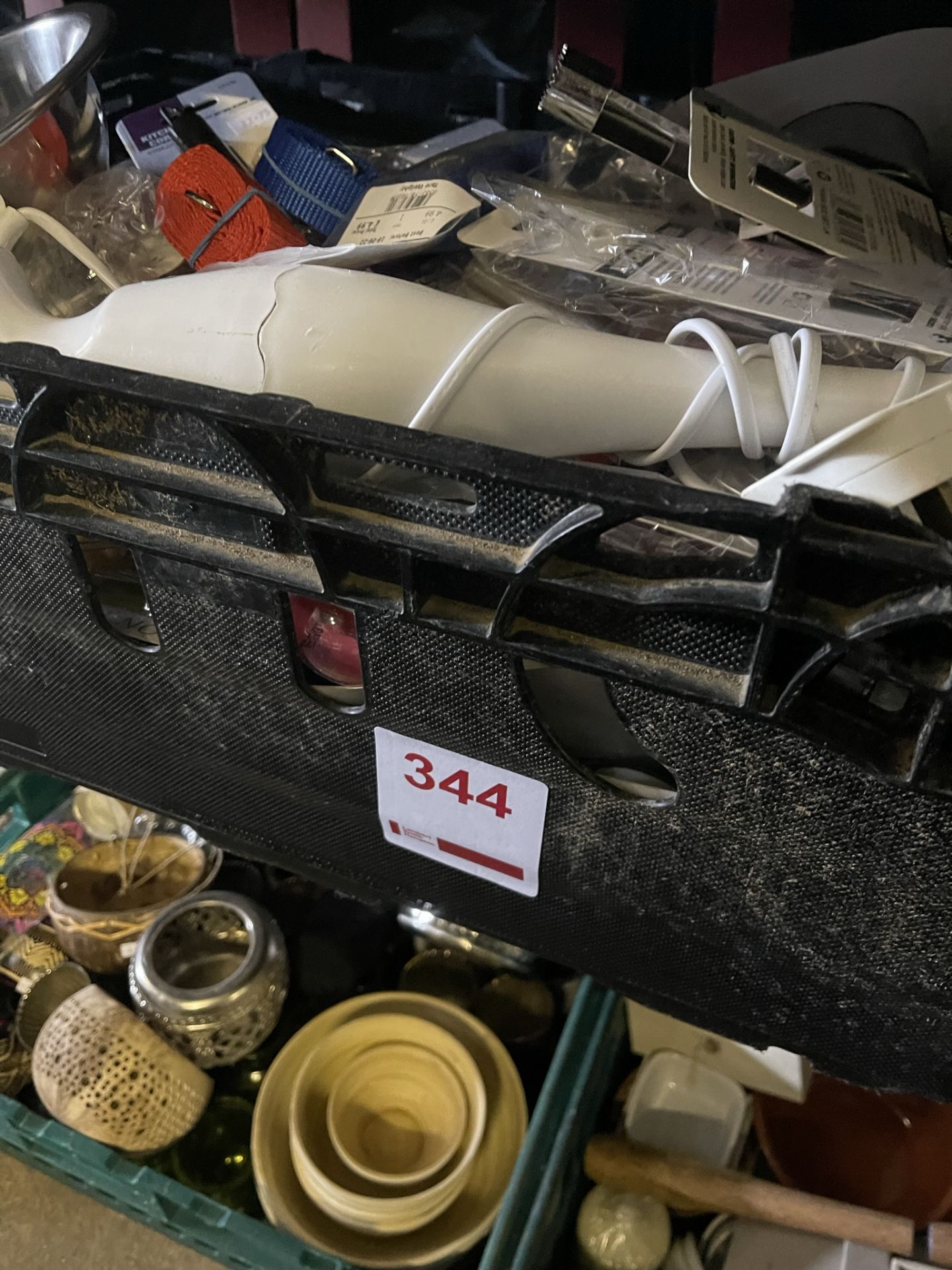 Box of various kitchen utensils