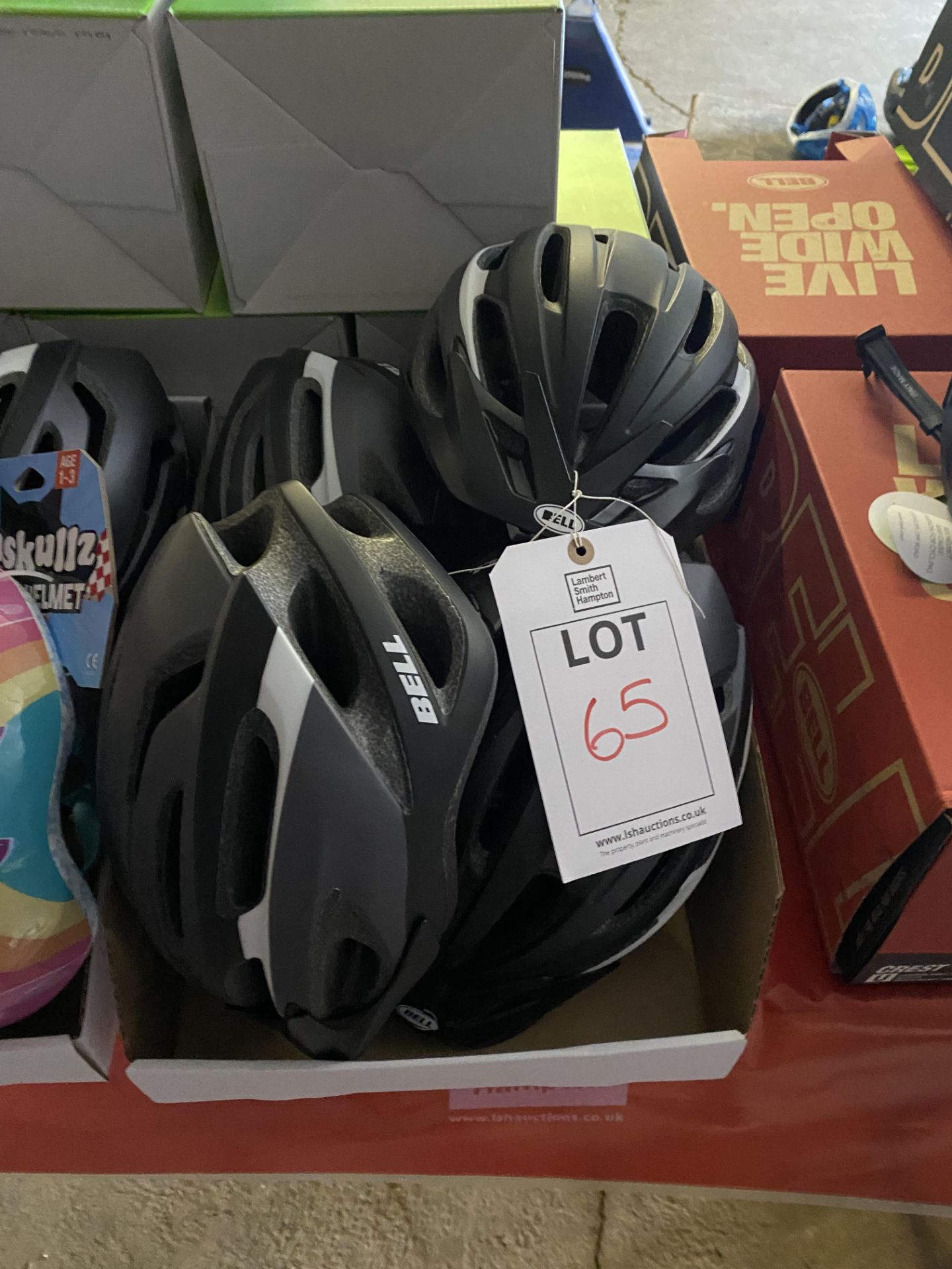 Five Bell cycle helmets as lotted
