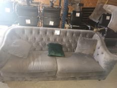 Velour upholstered two seater settee with three cushions