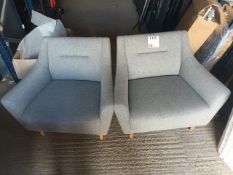 Two grey upholstered armchairs