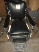 Black leather upholstered hydraulic salon chair (no head rest)