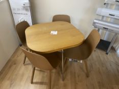Square wood topped table with 4 plastic chairs