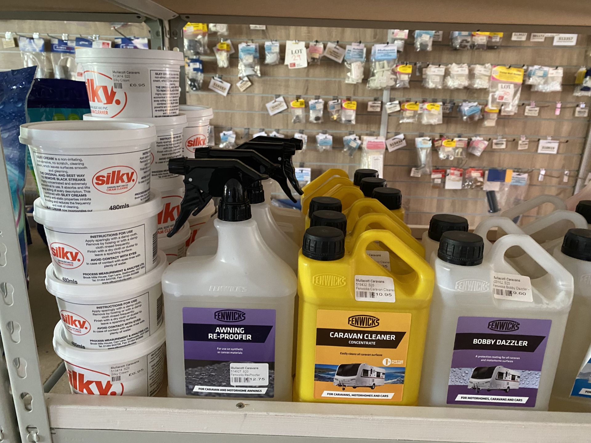 Contents of shelf to include caravan cleaning sprays, creams and re-proofers