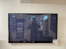 42" Samsung TV, wall mounted, with remote