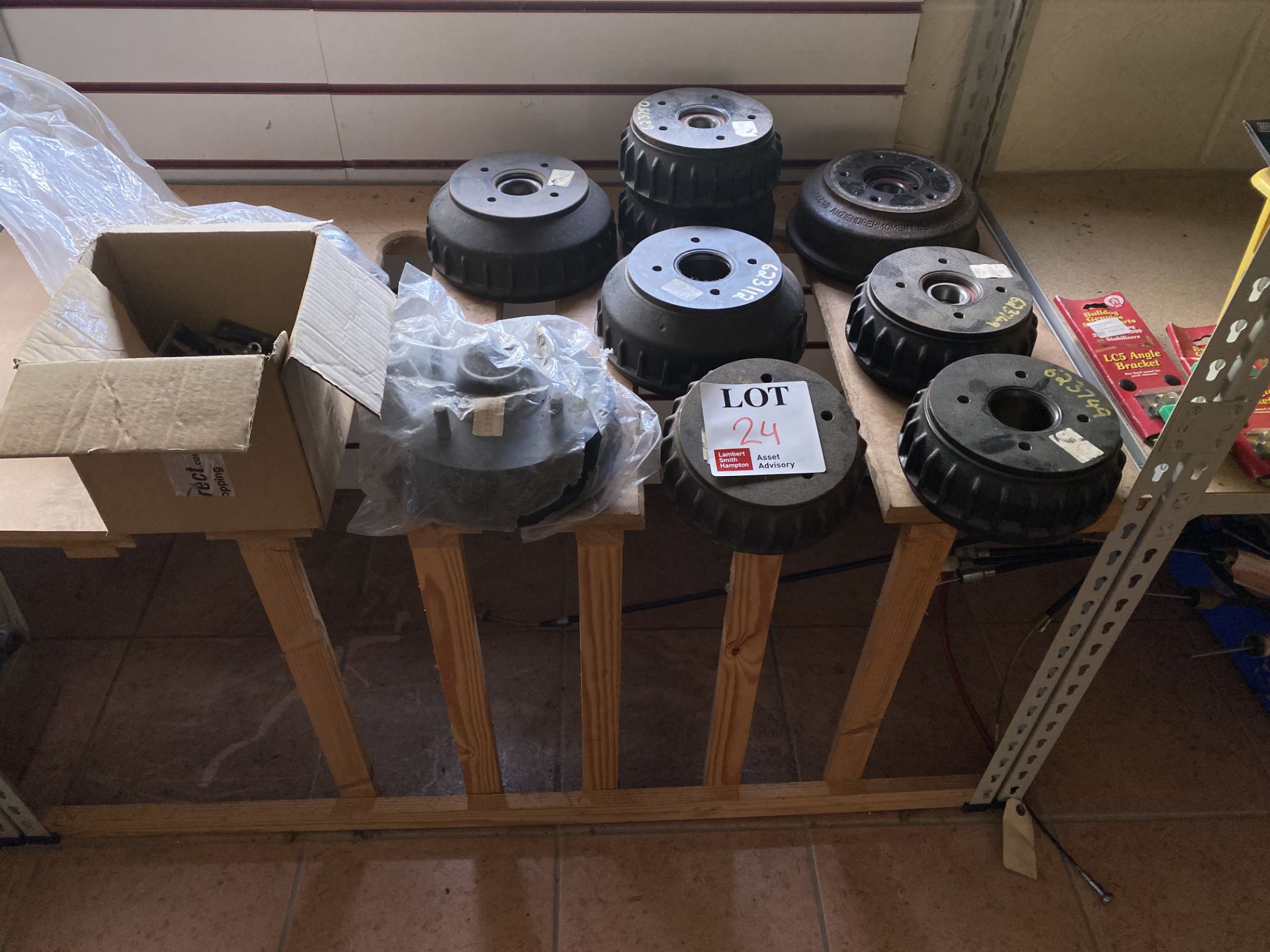Contents of shelf to include various brake drums