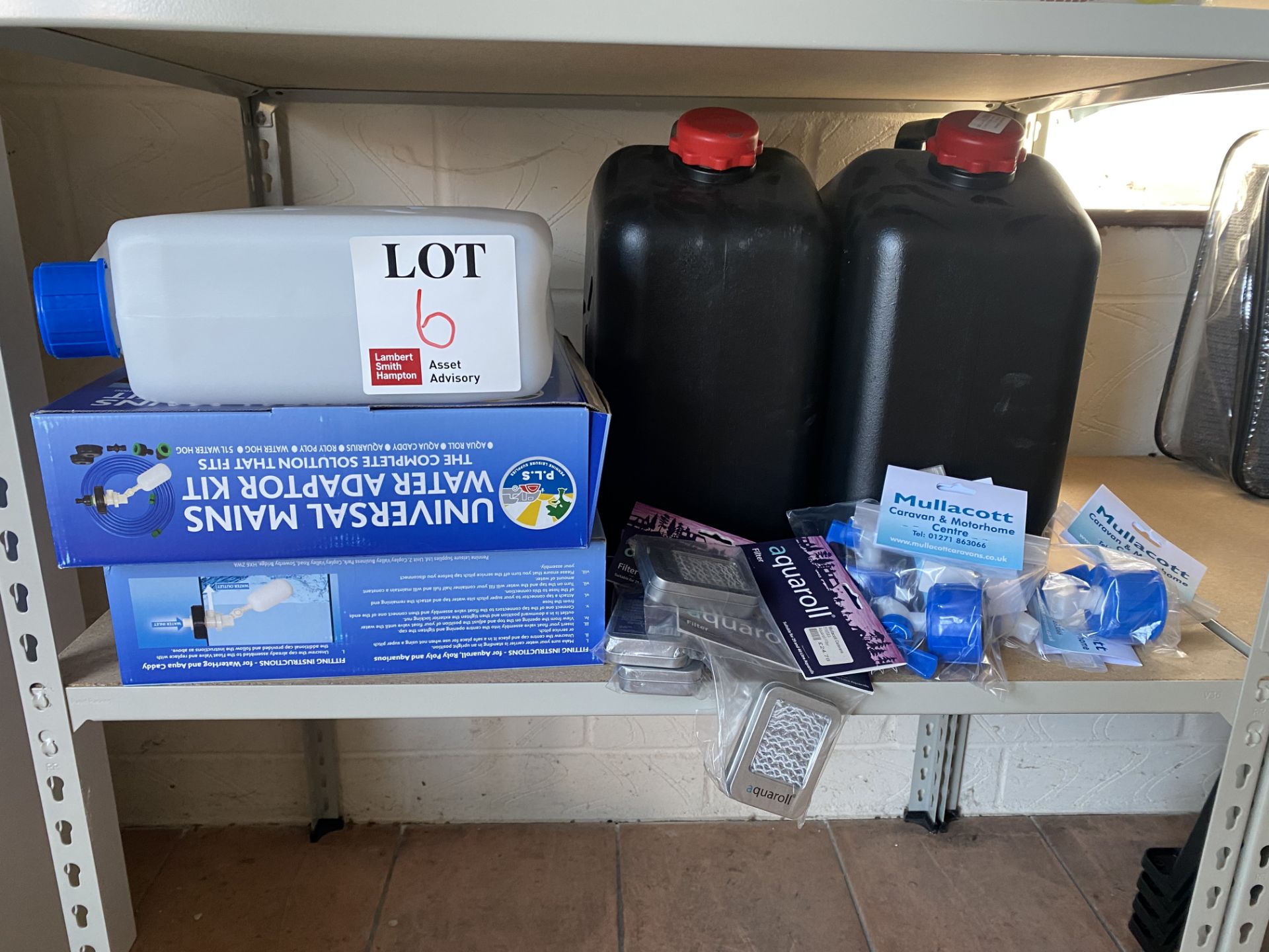 Contents of shelf to include water containers, Aquaroll filters, mains water adaptor kits