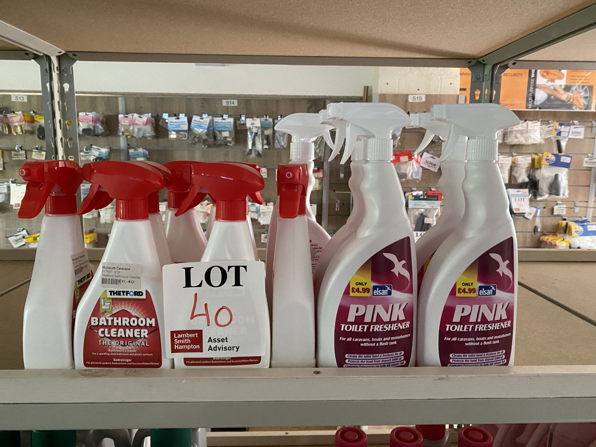 Contents of shelf to include toilet spray cleaners