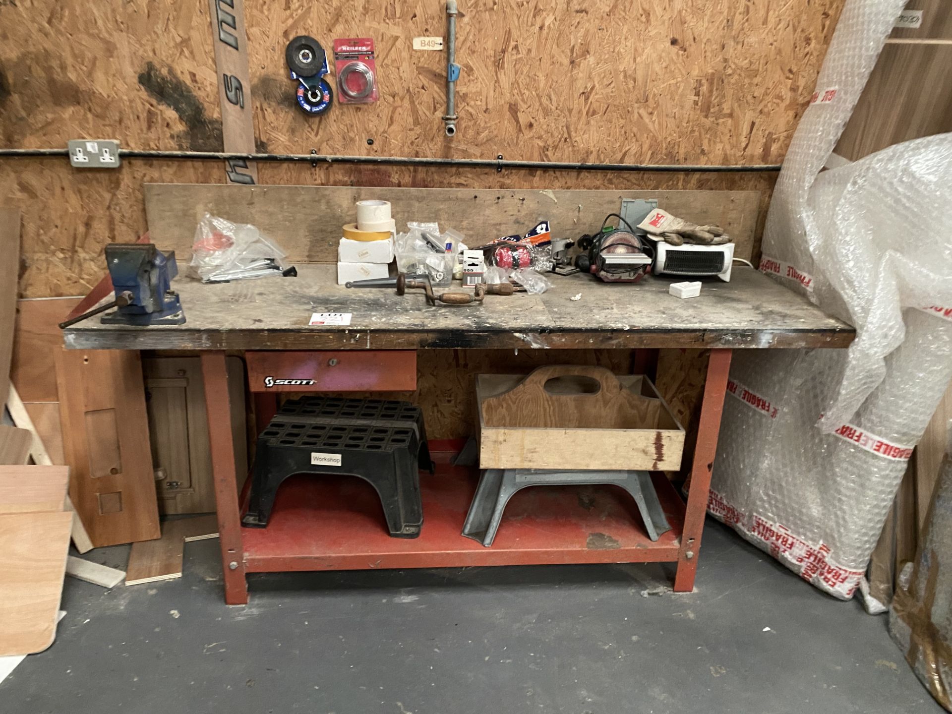 One metal framed wood topped workbench and contents as lotted 2m length x 88cm height x 67cm width
