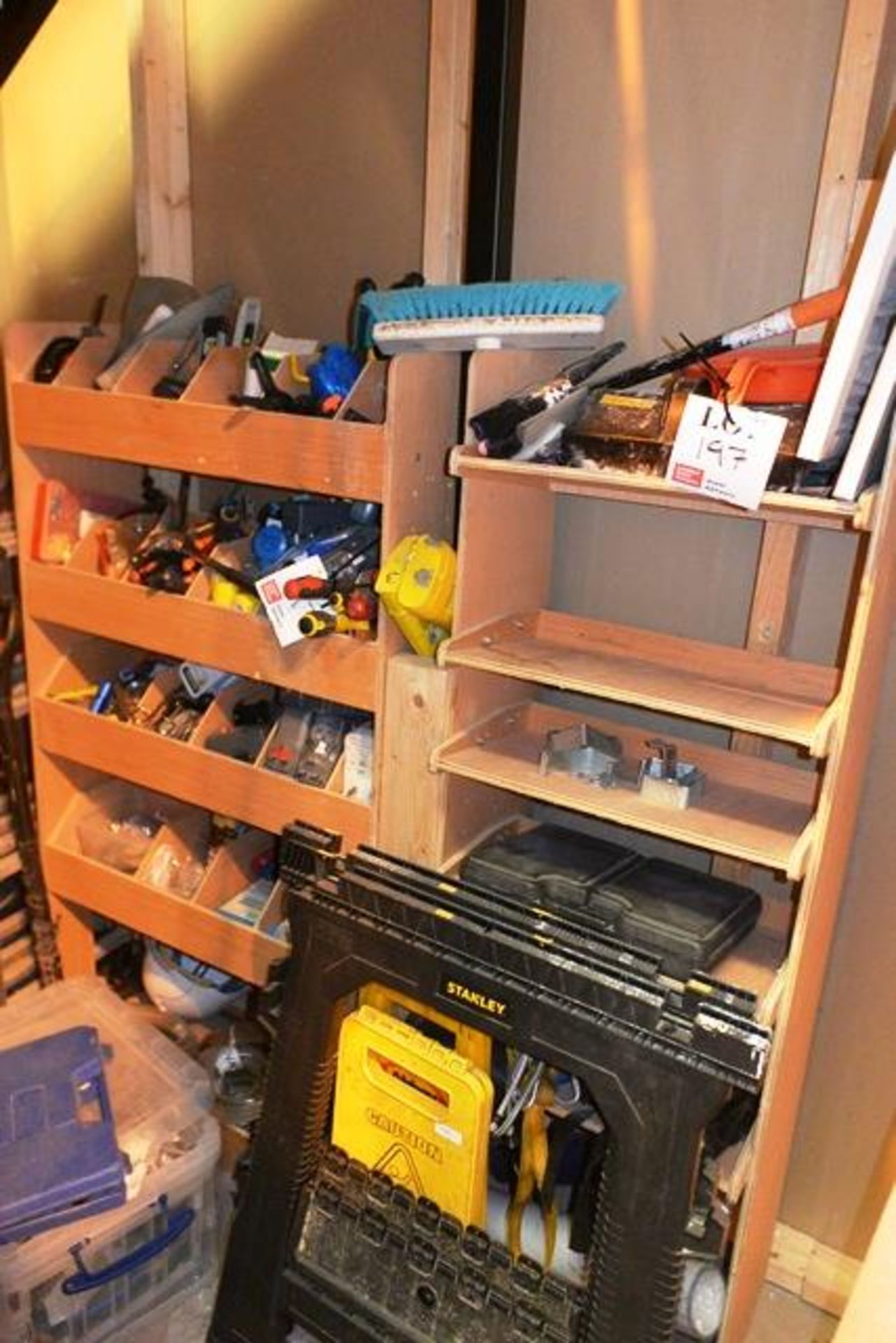 Quantity of various hand tools, etc., as lotted on storage rack