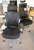 Six black mesh office swivel chairs